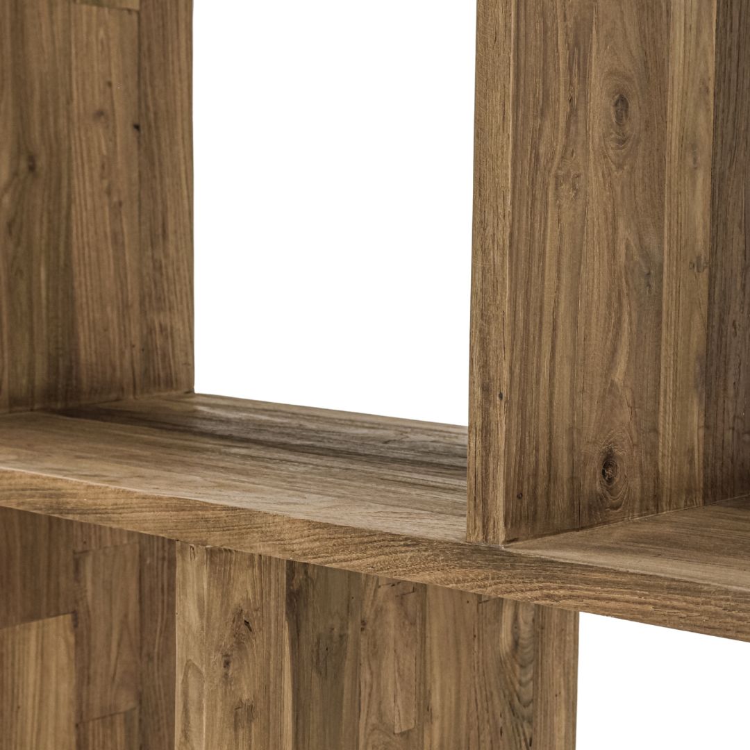 Close-up of a wooden shelf with a white background